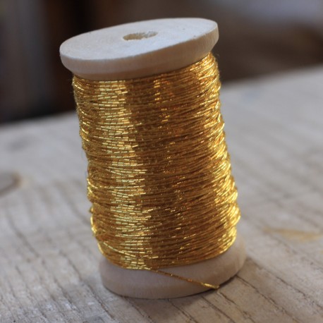 Spun gold on wooden bobbin - 0.45mm